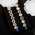 18K  Chanel Script Pendant Earrings