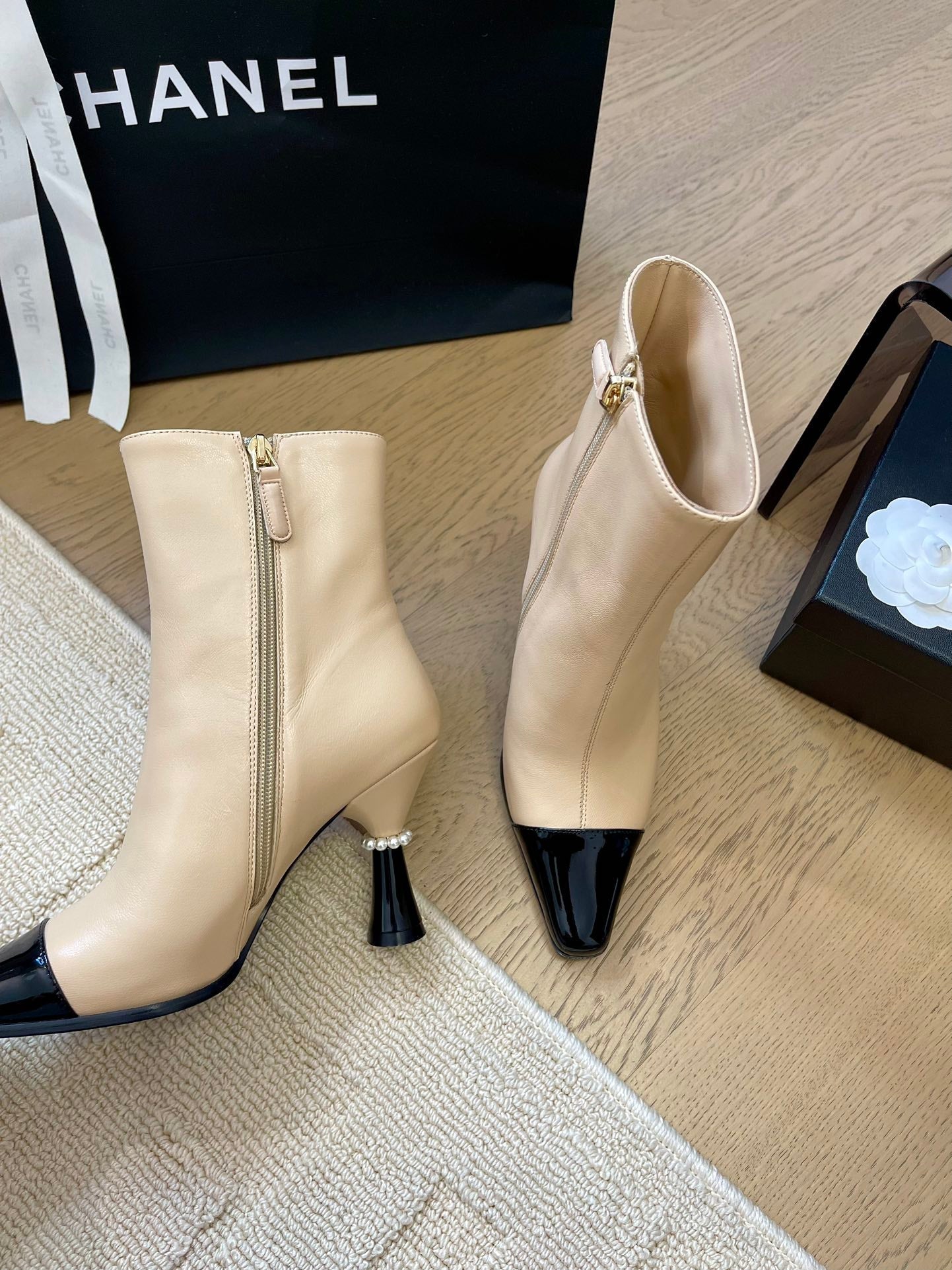 CHANEL BONGADE BOOTS IN BEIGE MIX BLACK CALFSKIN